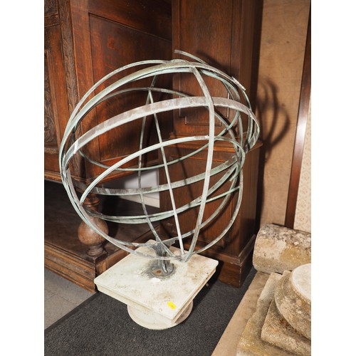 729 - An armillary sphere, mounted on a square base, 27