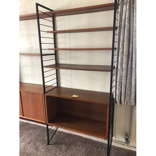 668 - A range of 1960s Staples Ladderax 2000 wall shelving, including cupboard, open cabinet, seven uprigh... 