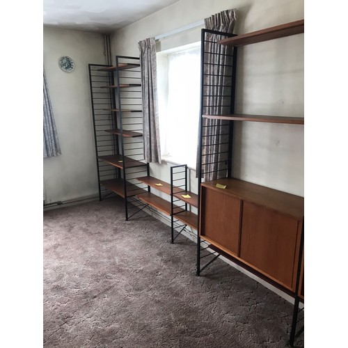 668 - A range of 1960s Staples Ladderax 2000 wall shelving, including cupboard, open cabinet, seven uprigh... 