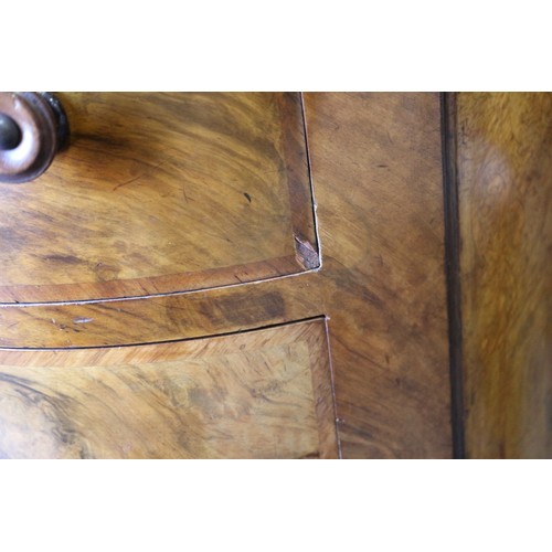 556 - A late 19th century figured walnut kidney-shaped double pedestal desk with tooled leather lined top,... 