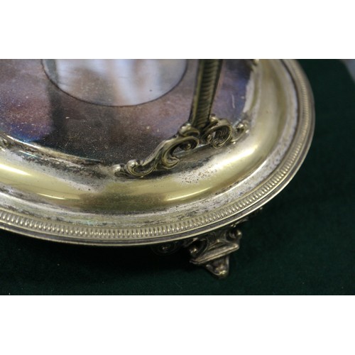 314 - A silver plated two-handled tray with engraved decoration and a plated and cut glass biscuit barrel ... 