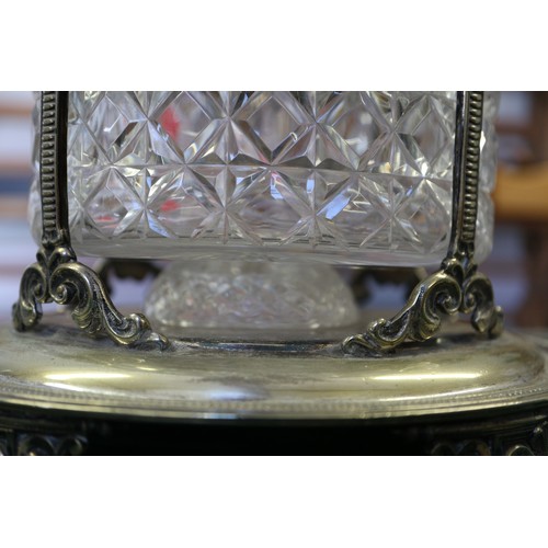 314 - A silver plated two-handled tray with engraved decoration and a plated and cut glass biscuit barrel ... 