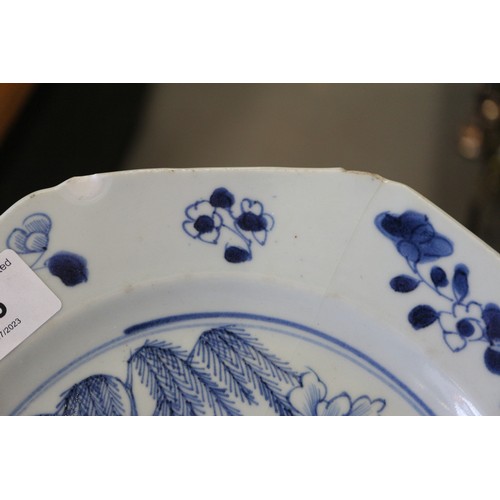 56 - A Chinese blue and white dish with floral and scrolled decoration with seal mark to base, 7 1/2