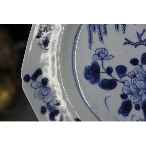 56 - A Chinese blue and white dish with floral and scrolled decoration with seal mark to base, 7 1/2