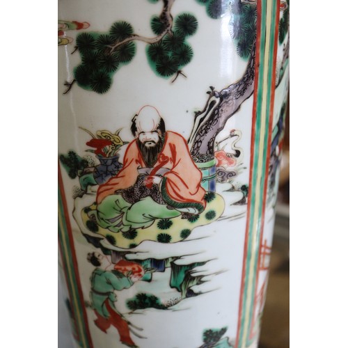 59 - A Chinese famille verte vase with panels of figures in a landscape decoration, 18 1/2