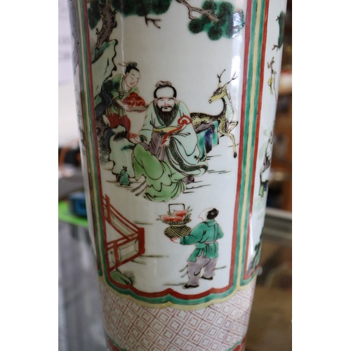 59 - A Chinese famille verte vase with panels of figures in a landscape decoration, 18 1/2