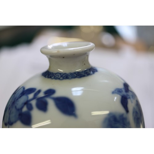 65 - A Chinese blue and white meiping vase with figure on horseback in a landscape decoration, 4 1/4