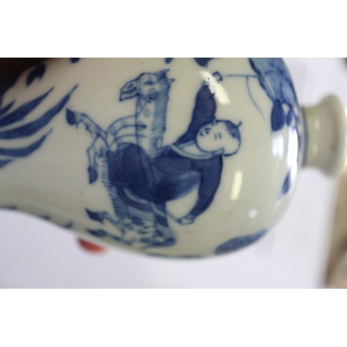 65 - A Chinese blue and white meiping vase with figure on horseback in a landscape decoration, 4 1/4