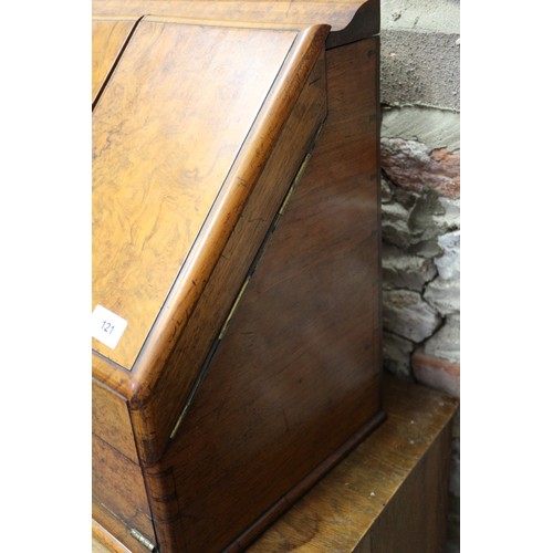 121 - A 19th century burr walnut desk tidy enclosed two doors with calendar cards over writing slope drawe... 