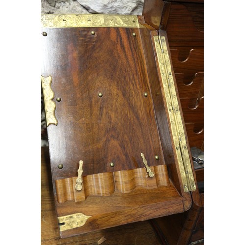 121 - A 19th century burr walnut desk tidy enclosed two doors with calendar cards over writing slope drawe... 