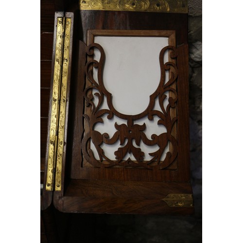 121 - A 19th century burr walnut desk tidy enclosed two doors with calendar cards over writing slope drawe... 