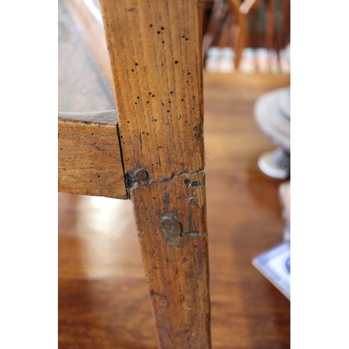 553 - An 18th century provincial chestnut and fruitwood two-tier cricket table, 26