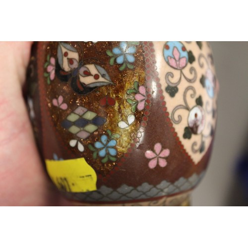 54 - A Chinese cloisonne jar and cover with floral and scrolled decoration, on tripod splayed supports, 4... 