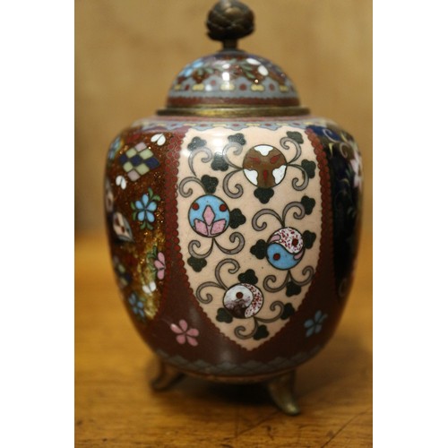 54 - A Chinese cloisonne jar and cover with floral and scrolled decoration, on tripod splayed supports, 4... 