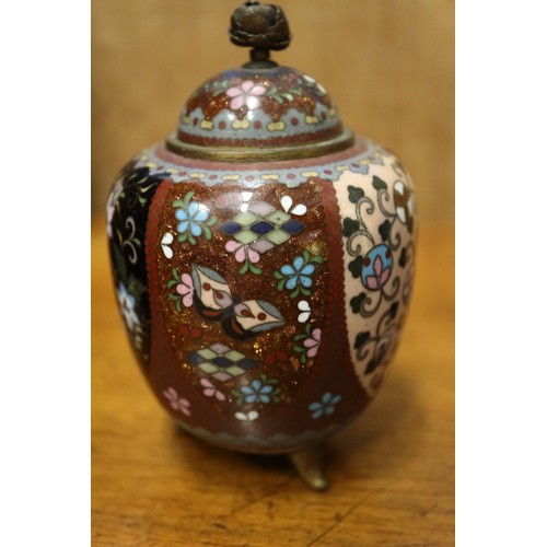 54 - A Chinese cloisonne jar and cover with floral and scrolled decoration, on tripod splayed supports, 4... 