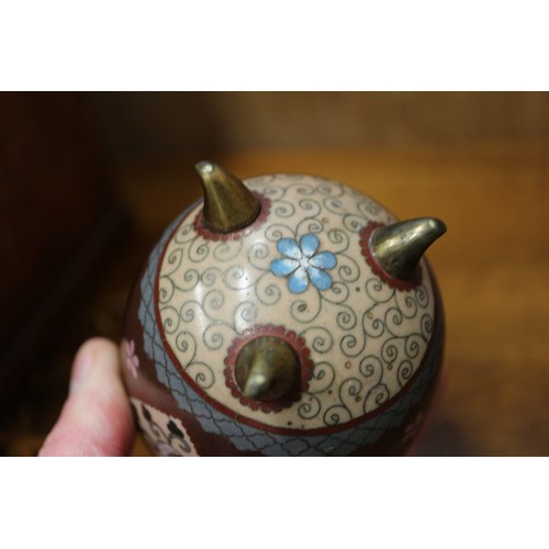 54 - A Chinese cloisonne jar and cover with floral and scrolled decoration, on tripod splayed supports, 4... 