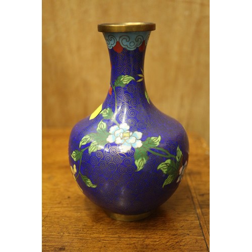 54 - A Chinese cloisonne jar and cover with floral and scrolled decoration, on tripod splayed supports, 4... 