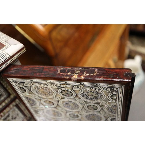 118 - A mahogany and mother-of-pearl inlaid jewellery cabinet, 13