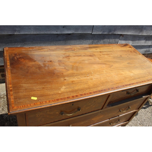 599 - An Edwardian mahogany and inlaid dressing chest of two short  three and two long drawers, on square ... 