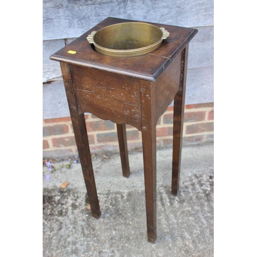 562 - An Edwardian walnut and satinwood banded circular two-tier occasional table, on square taper support... 