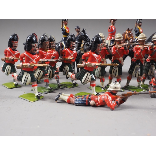 147 - A selection of Britains lead painted toy soldiers including English and Scottish Line Infantry, and ... 