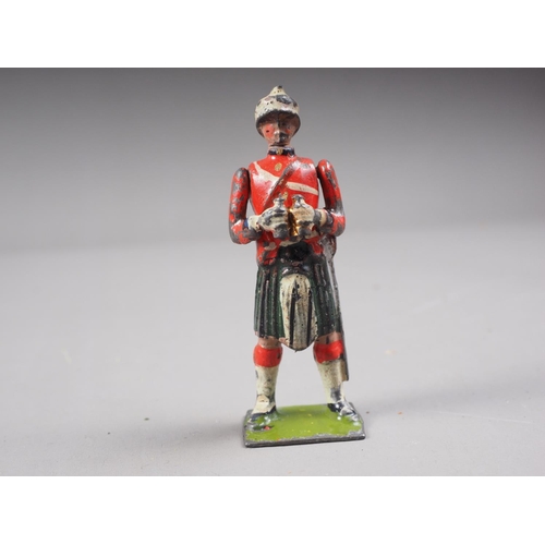 147 - A selection of Britains lead painted toy soldiers including English and Scottish Line Infantry, and ... 