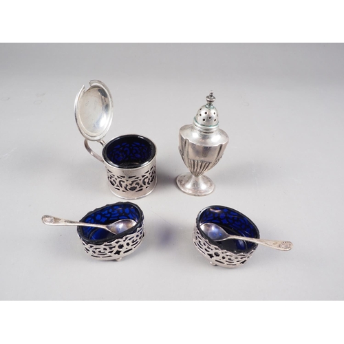 274 - A silver three-piece cruet with blue glass liners and a silver half fluted pepperette, 2.5oz troy ap... 