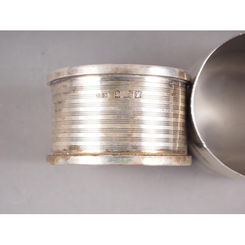 276 - Three silver napkin rings, 1.7oz troy approx, and a silver cream jug, 2.2oz troy approx