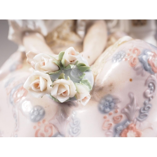 3 - A Lladro figure of a young girl with a bunch of flowers sat on a throne, 10 1/2