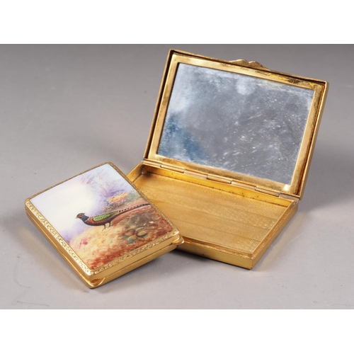 314 - A gilt metal and enamelled rectangular compact with boat at sea design, 3