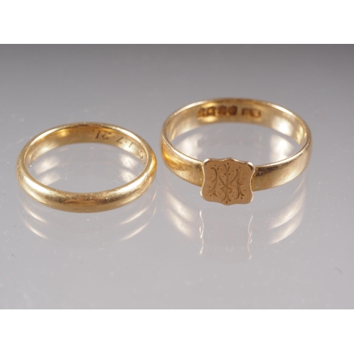 330 - An 18ct gold wedding band, size L, 3.8g, and a Scottish 18ct gold signet ring, 4.1g, size T