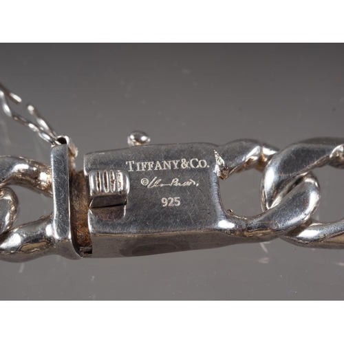 352 - A white metal curb link bracelet, stamped 