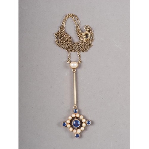 361 - A late 19th century yellow metal pendant necklace, set seed pearls and sapphires, pendant marked 15c... 