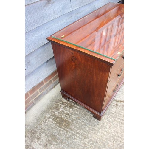 442 - A 19th century mahogany box line inlaid chest of two short and two long graduated drawers with bail ... 