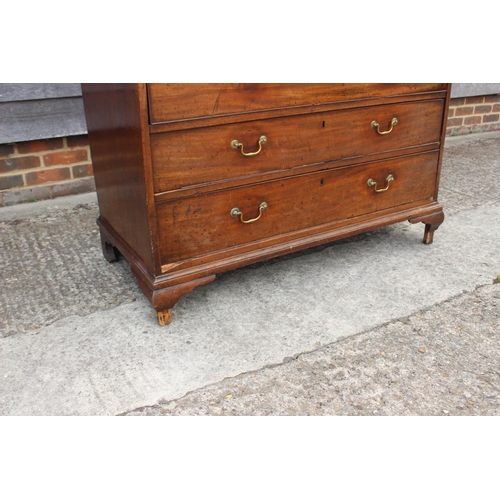 465 - A Georgian mahogany fall front bureau, the interior fitted drawers and pigeonholes over two short an... 