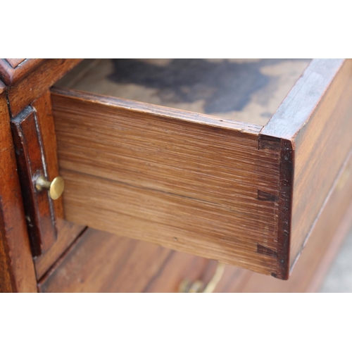 465 - A Georgian mahogany fall front bureau, the interior fitted drawers and pigeonholes over two short an... 