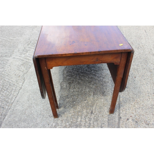 468 - An early 19th century mahogany Pembroke dining table with deep leaves, on chamfered supports, 47