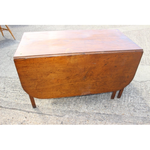 468 - An early 19th century mahogany Pembroke dining table with deep leaves, on chamfered supports, 47