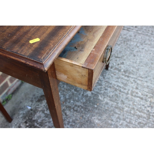 469 - A 19th century walnut side table, fitted one drawer with oval brass handles, on square taper support... 