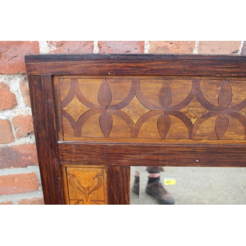 478 - A stained and inlaid rectangular over-mantel mirror with bevelled plate, 35