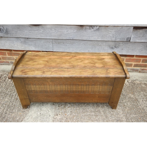 501 - A 1930s oak arcade carved front linen chest, 39