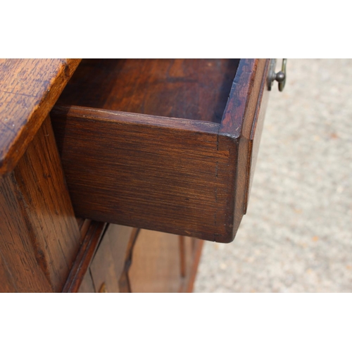 534 - A Titchmarsh & Goodwin oak dresser base of 17th century design, fitted three drawers over three ... 