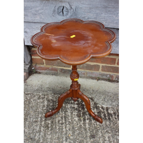 545 - A yew octofoil wine table, on turned column and carved tripod splay support, 16