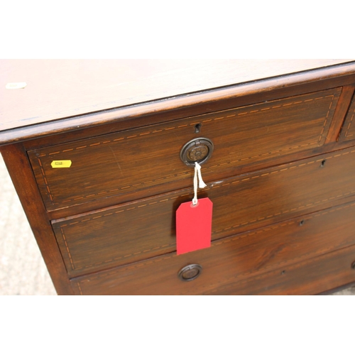 581 - An Edwardian walnut, box and ebony strung chest of two short and three long graduated drawers with r... 