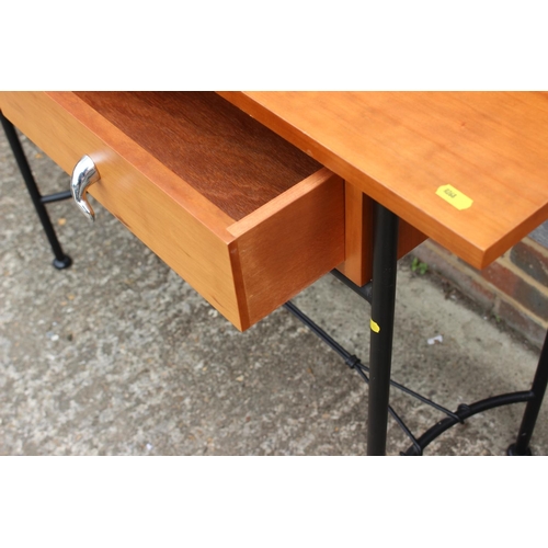 584 - A cherrywood and metal framed console table, fitted two drawers, on stretchered supports, 44 1/2