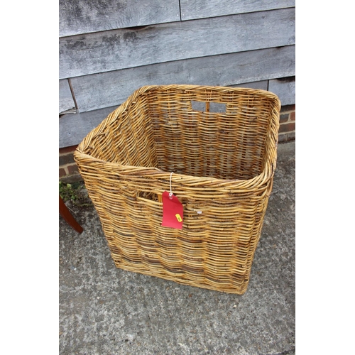 587 - A wicker log basket, 24