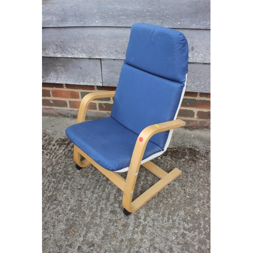 593 - A child's bentwood cantilever elbow chair and a child's rattan low seat armchair