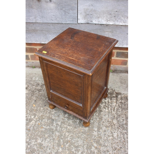 594 - An oak two-tier work table, on turned supports and an oak work box, on bun feet