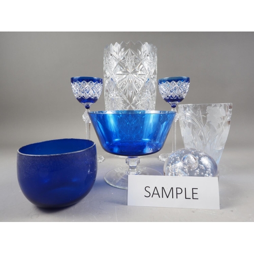 61 - A pair of blue overlaid cut glass hocks, 8 1/2