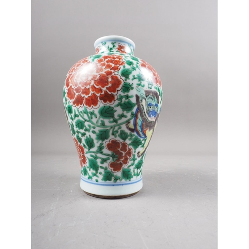 77 - *A Chinese famille verte baluster vase with mythical beast, chrysanthemum and leaf decoration, 7 1/4... 